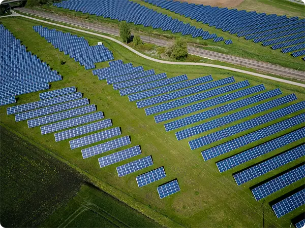 Aerial view of a large commercial ground-mount solar installation